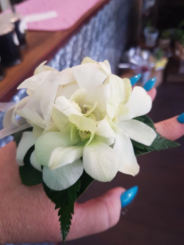 Petite orchid wrist corsage