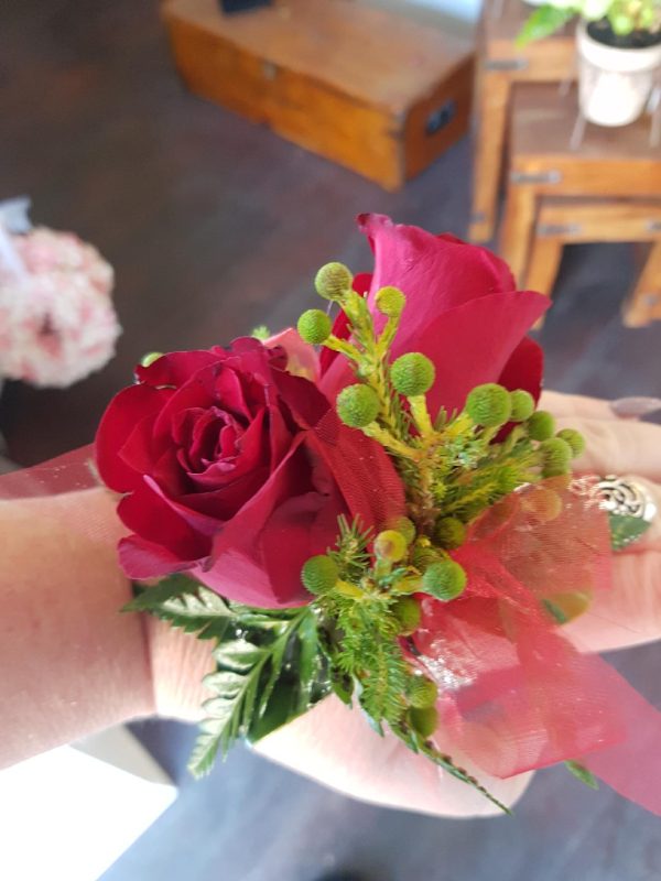 A red corsage
