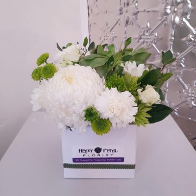 Arrangement of flowers in box