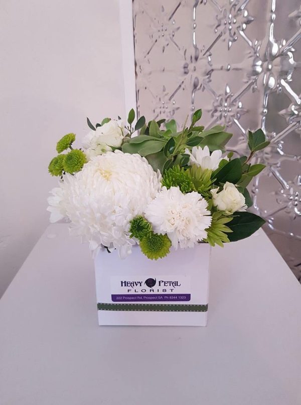 Arrangement of flowers in box