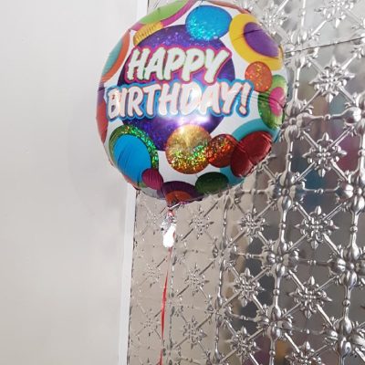 Helium balloon with the words "Happy Birthday!"