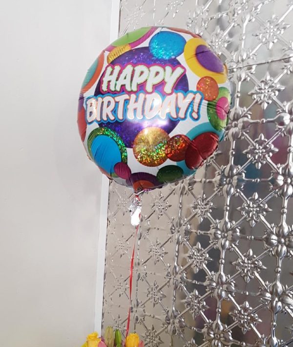 Helium balloon with the words "Happy Birthday!"