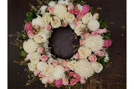 A White, Pink and Green Tribute Wreath