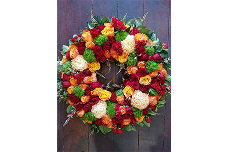 A Yellow, Green and Red Tribute Wreath