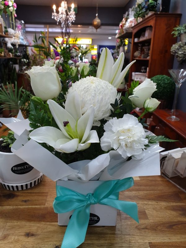 A bouquet of lilies and flowers.