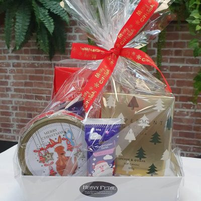 Christmas-themed hamper with candle